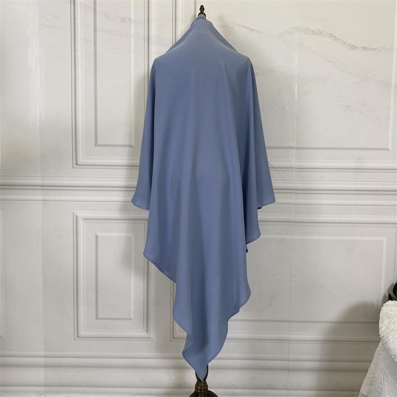 Thobeluxe Premium Nidha Khimar lightweight, breathable, and drapes and is comfortable. Colour blue