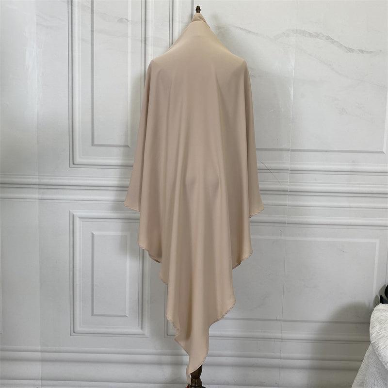 Thobeluxe Premium Nidha Khimar lightweight, breathable, and drapes and is comfortable. Colour beige