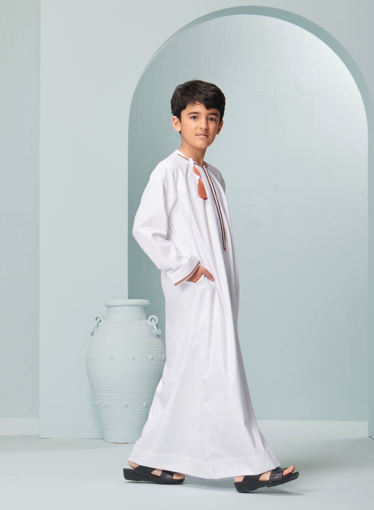 Kids Embroidered White Thobe with Copper Tassel Ages 3-13 Kids Omaar thobe in white, Thobeluxe stylish embroidered Omani-style thobes for boys