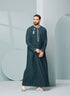 Men's Omani Style Thobe in Teal with Silver Tassel Omaar, our stylish mens embroidered Omani style thobe! thobeluxe authentic saudi thobes, premium thobes