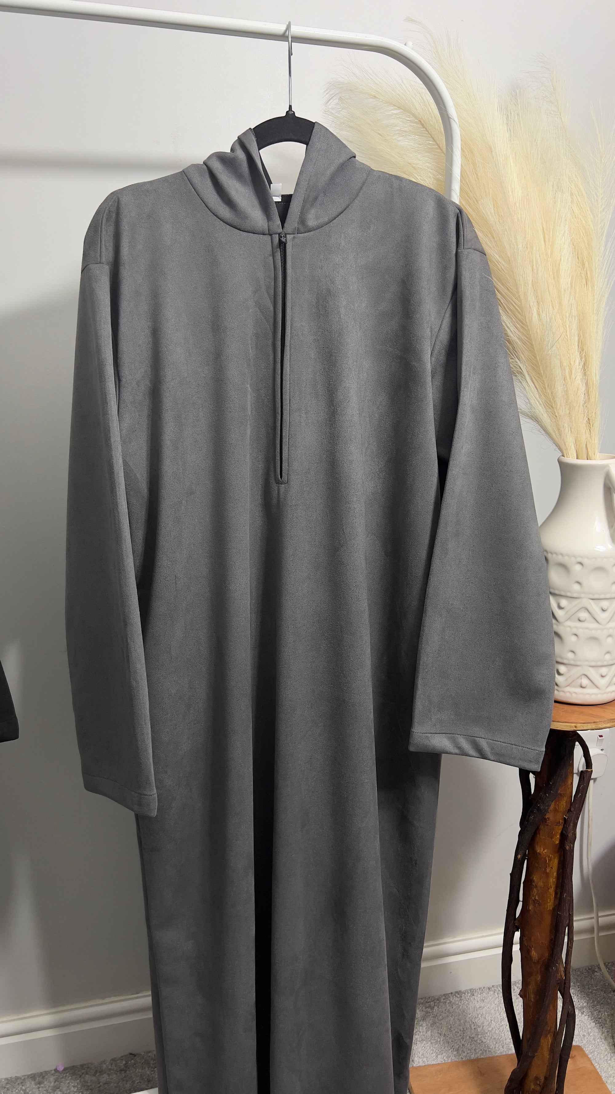 hooded and long sleeve thobe in suede material in grey colour worn by man