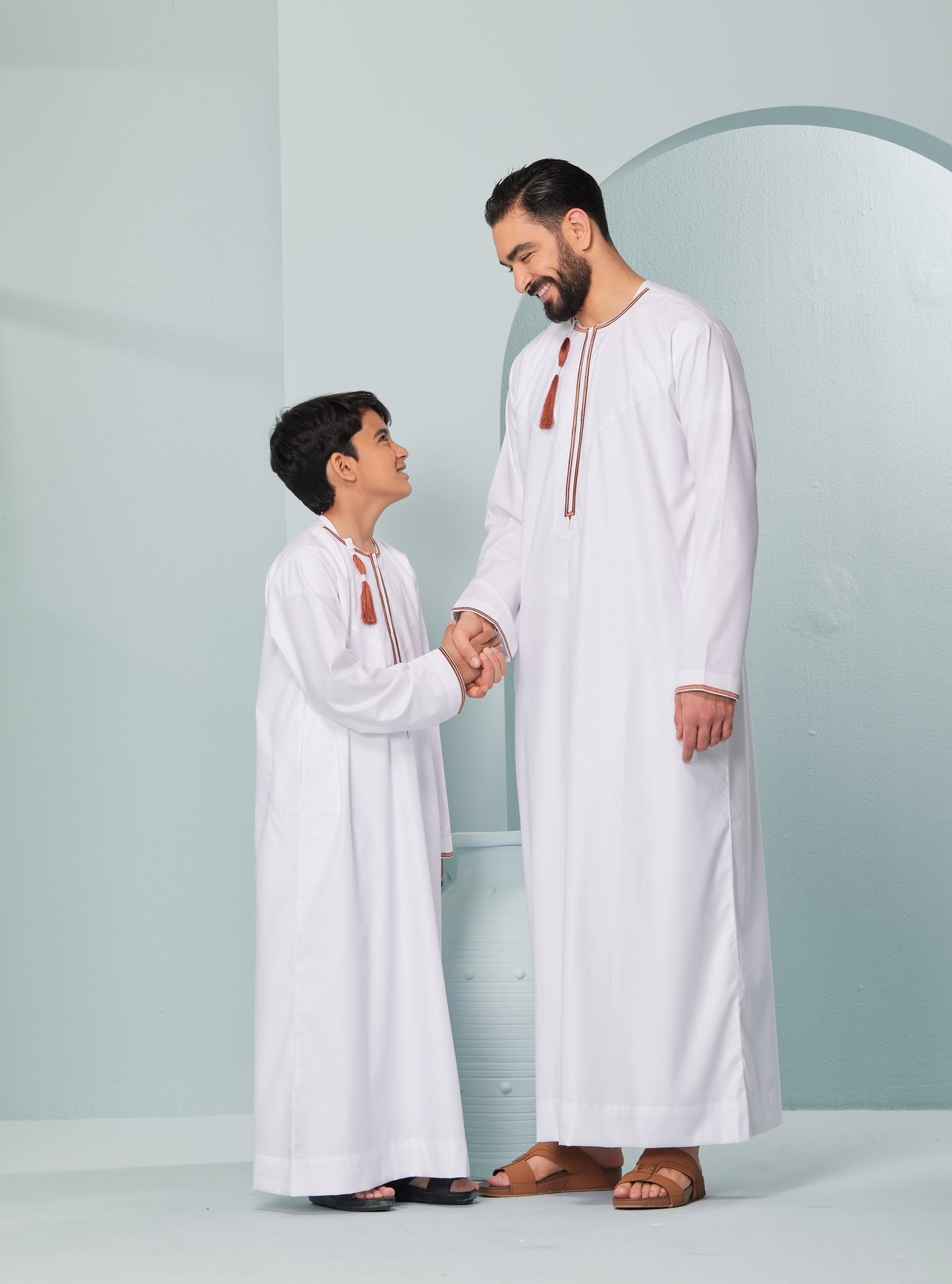 Kids Embroidered White Thobe with Copper Tassel Ages 3-13 Kids Omaar thobe in white, Thobeluxe stylish embroidered Omani-style thobes for boys