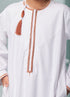 Kids Embroidered White Thobe with Copper Tassel Ages 3-13 Discover Kids Omaar thobe in white, Thobeluxe stylish embroidered Omani-style thobes for boys