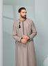 Men's Omani Style Thobe in Beige with Black Tassel, premium thobes, Omaar clothing thobeluxe stylish mens embroidered Omani style thobe