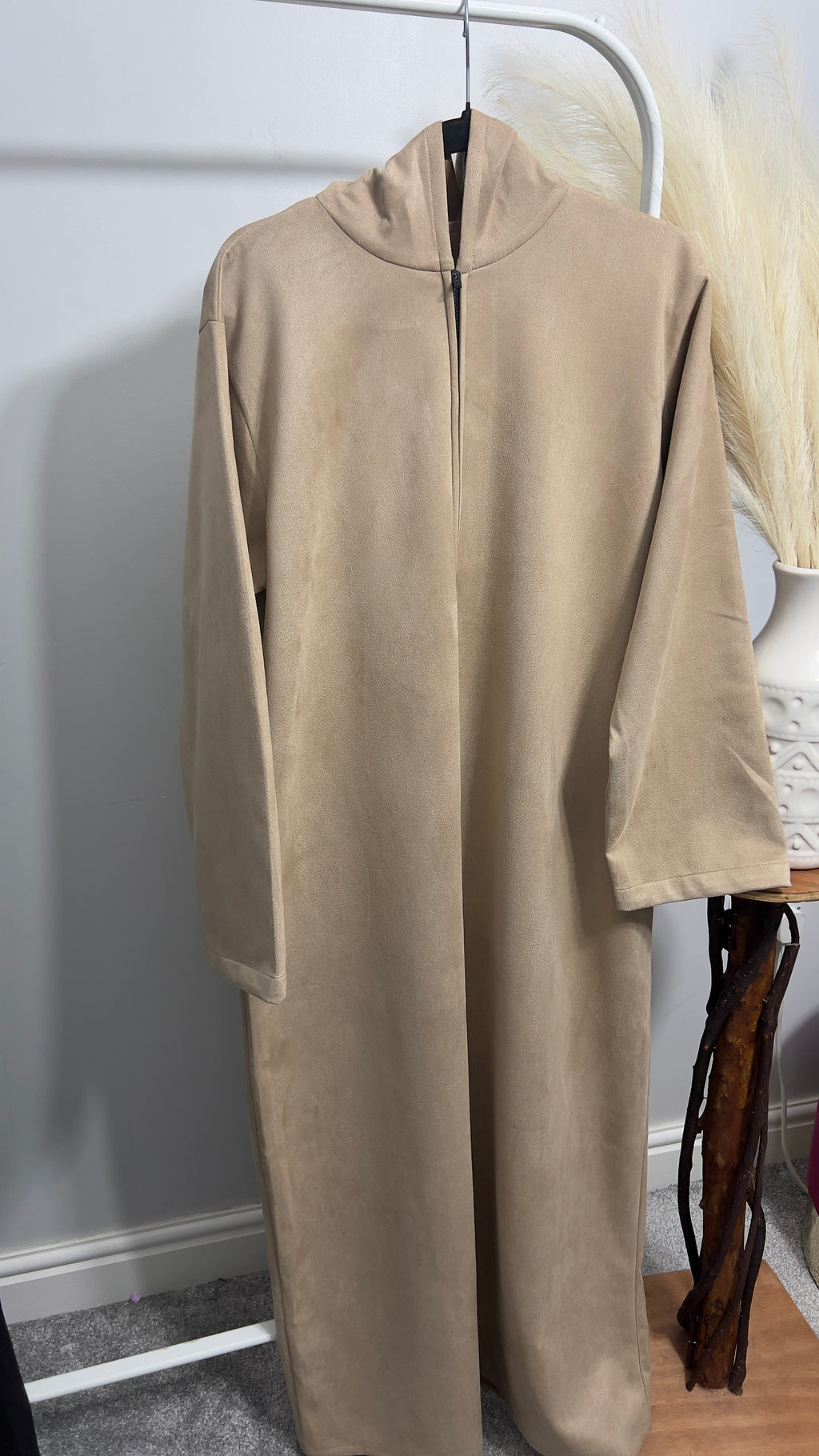 hooded and long sleeve thobe in suede material in beige colour worn by man