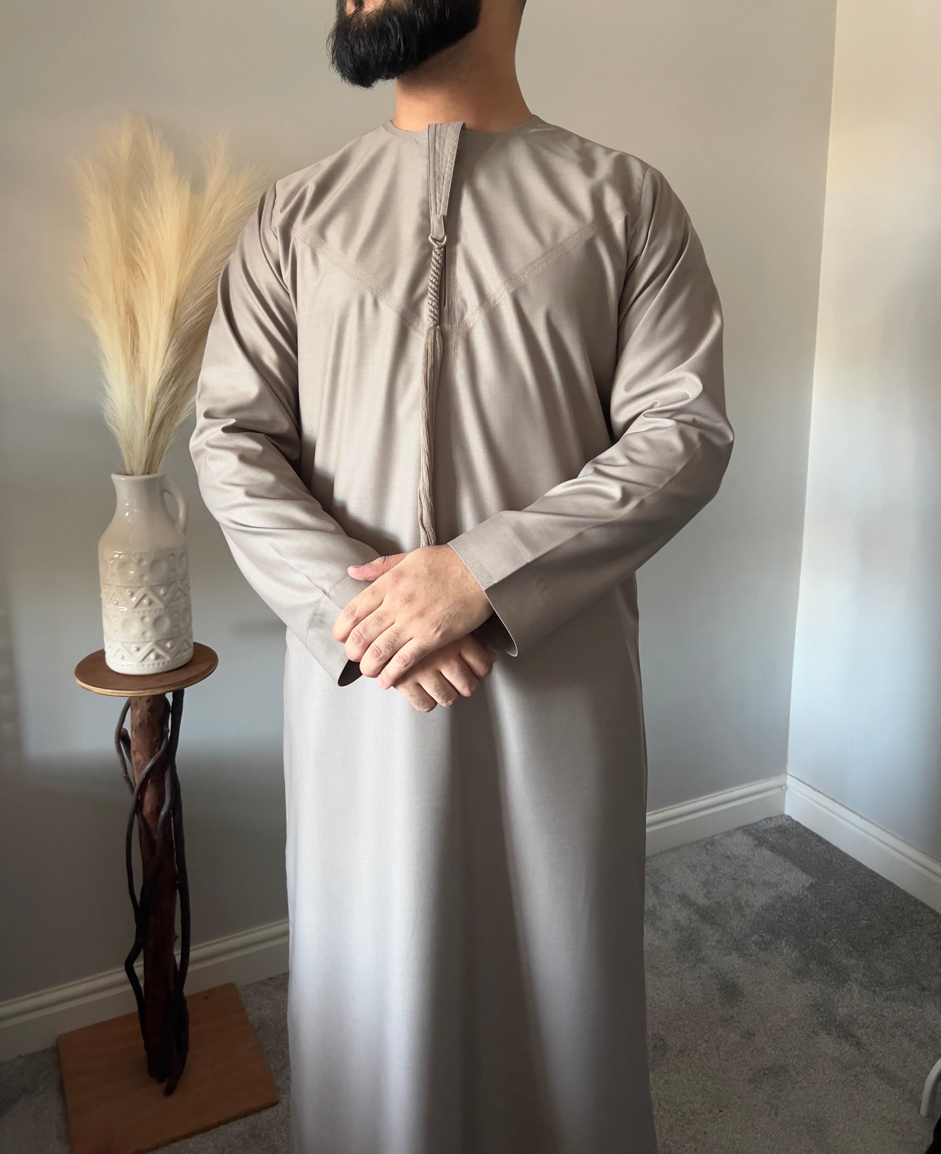 Thobeluxe Men’s Premium Emirati Thobe For Ramadan Taupe shade, part of our exclusive Ramadan Collection. Side Pockets Size 52-60 M to X-Large chest fit 