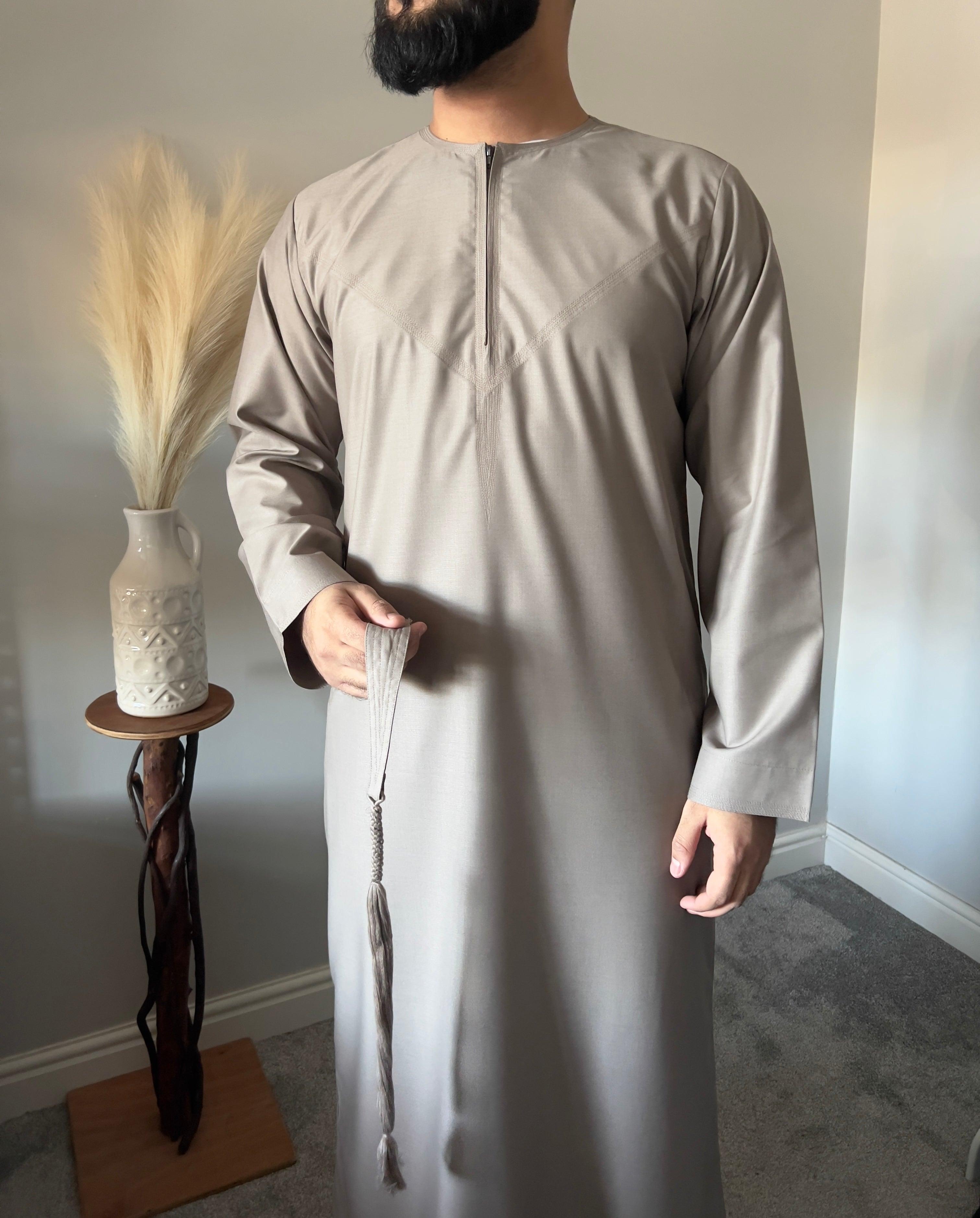 Thobeluxe Men’s Premium Emirati Thobe For Ramadan Taupe shade, part of our exclusive Ramadan Collection. Side Pockets Size 52-60 M to X-Large chest fit 
