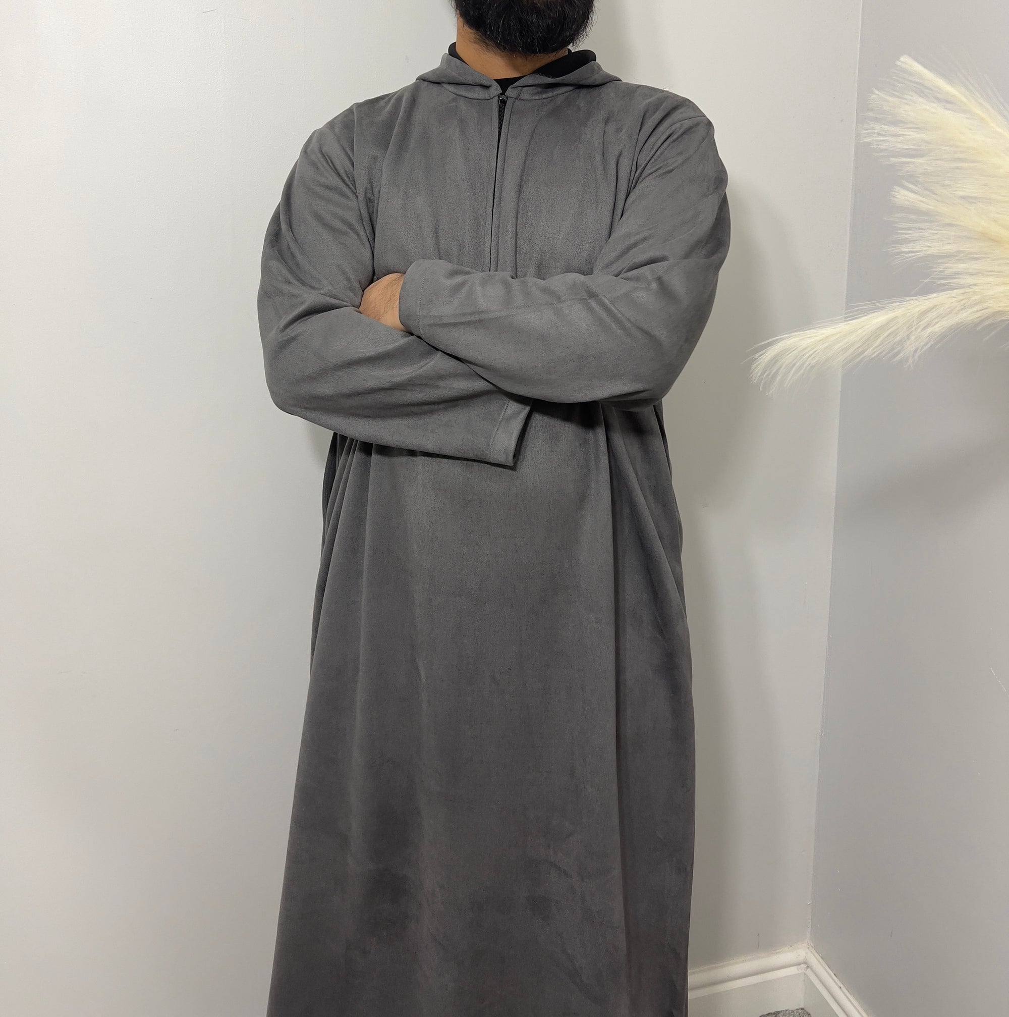hooded and long sleeve thobe in suede material in grey colour worn by man