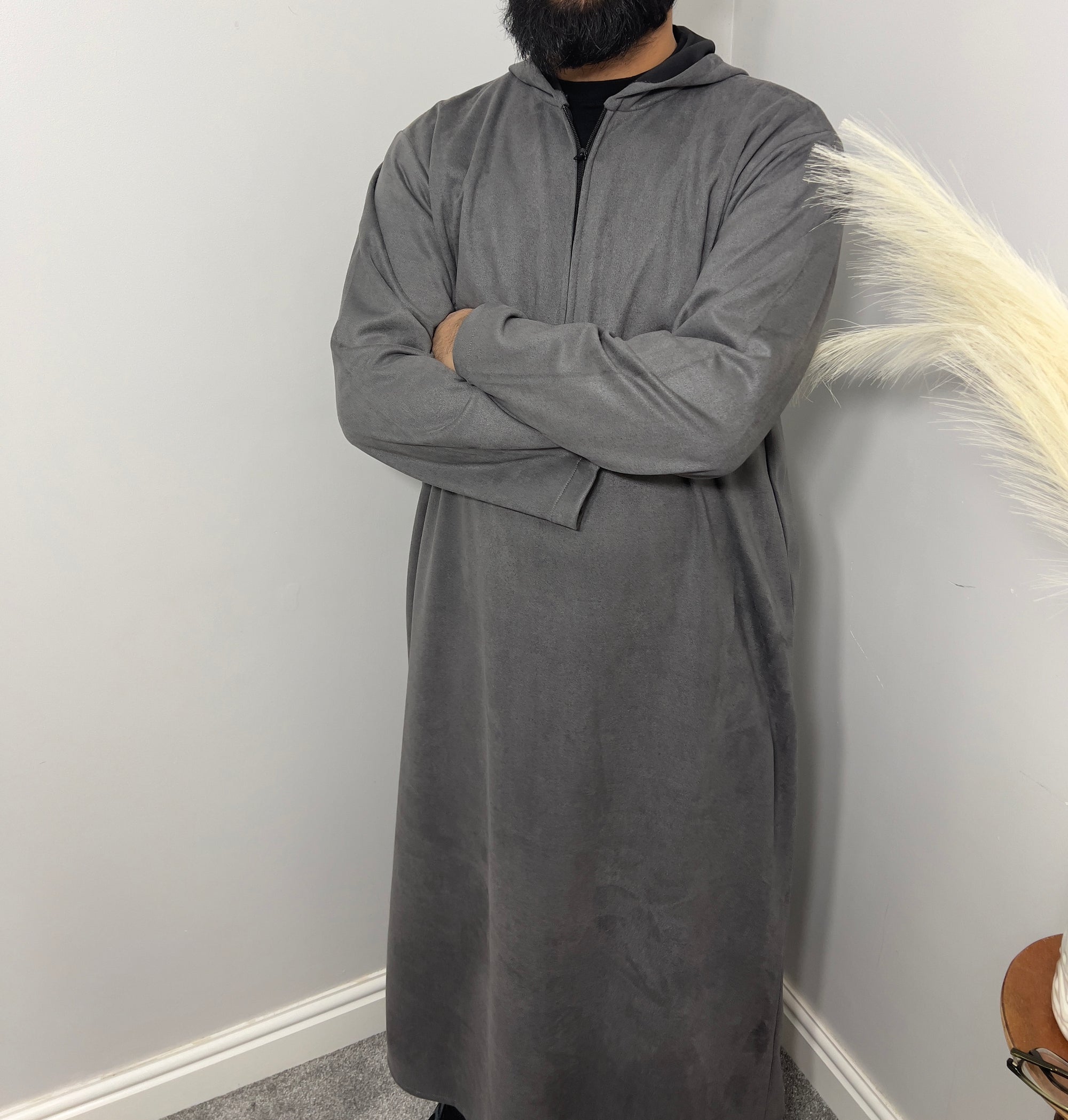 hooded and long sleeve thobe in suede material in grey colour worn by man