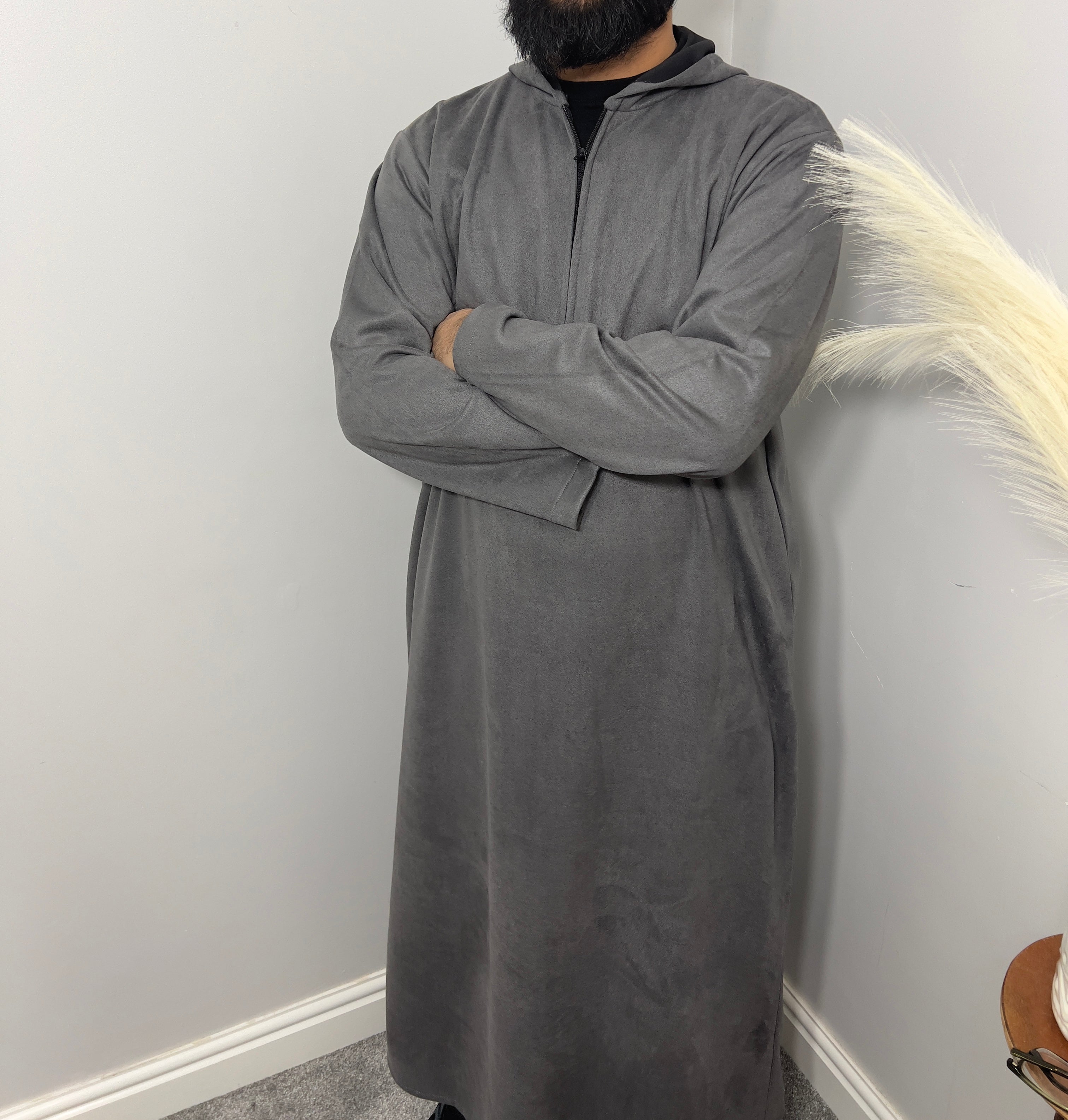 hooded and long sleeve thobe in suede material in grey colour worn by man