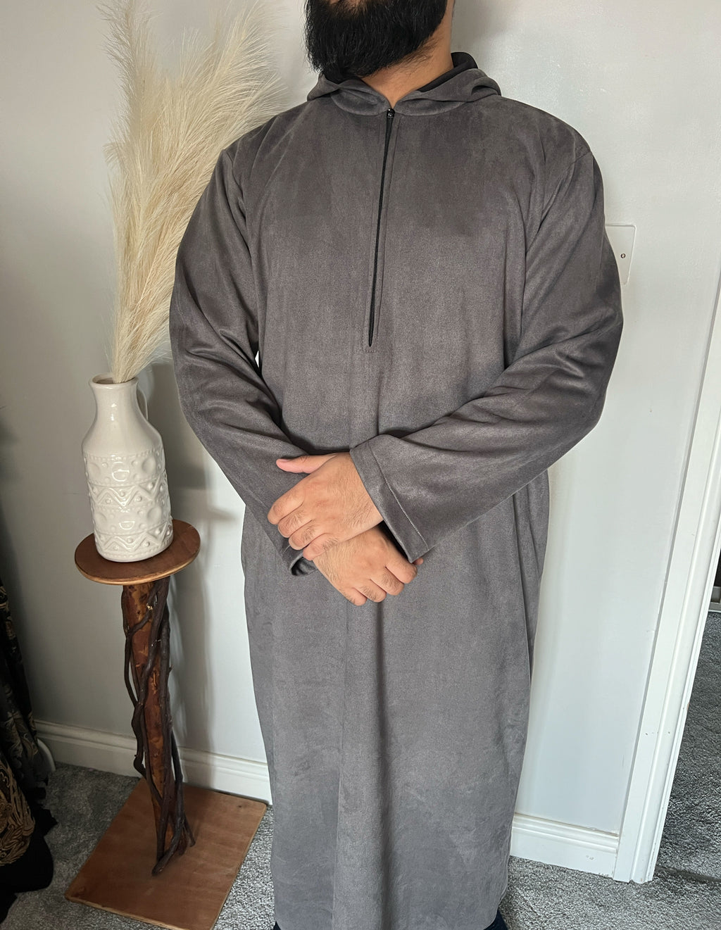 hooded and long sleeve thobe in suede material in grey colour worn by man