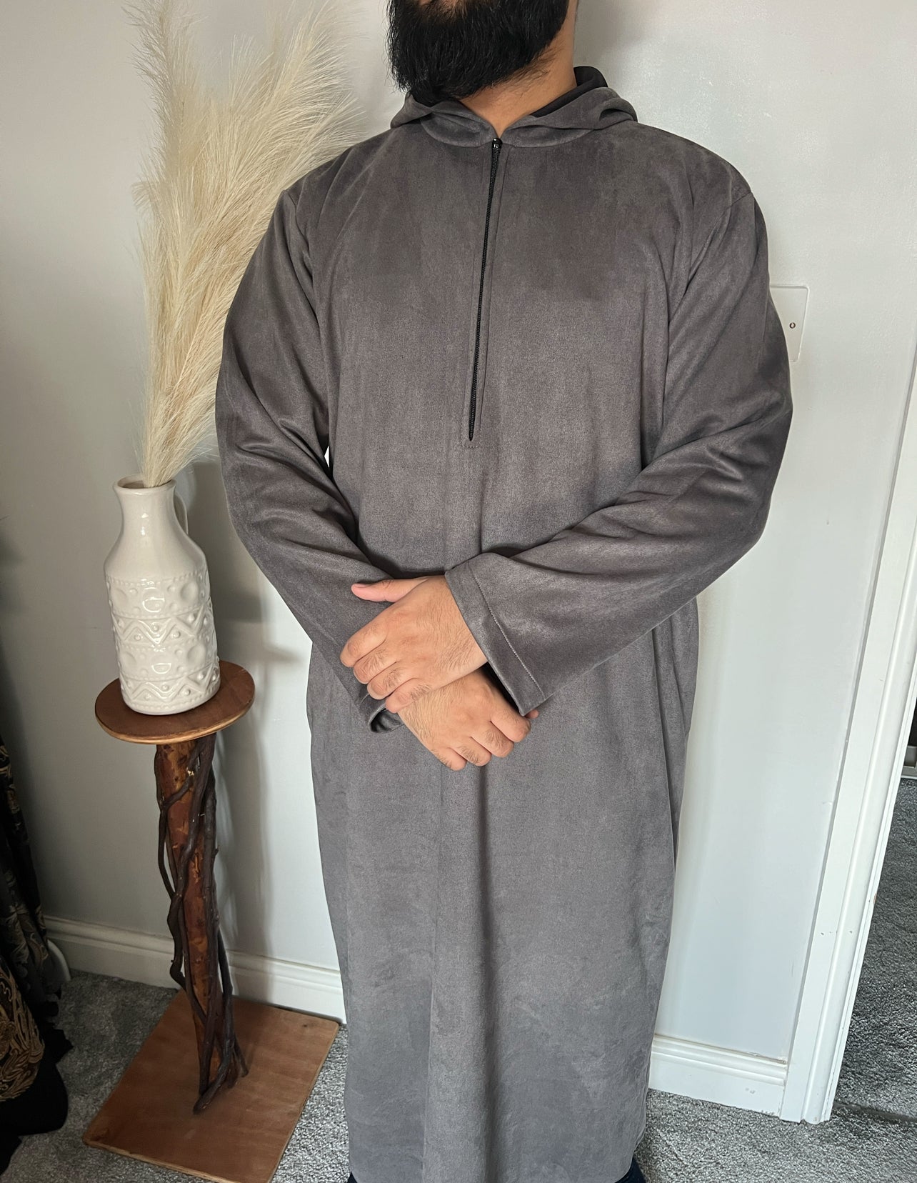 hooded and long sleeve thobe in suede material in grey colour worn by man
